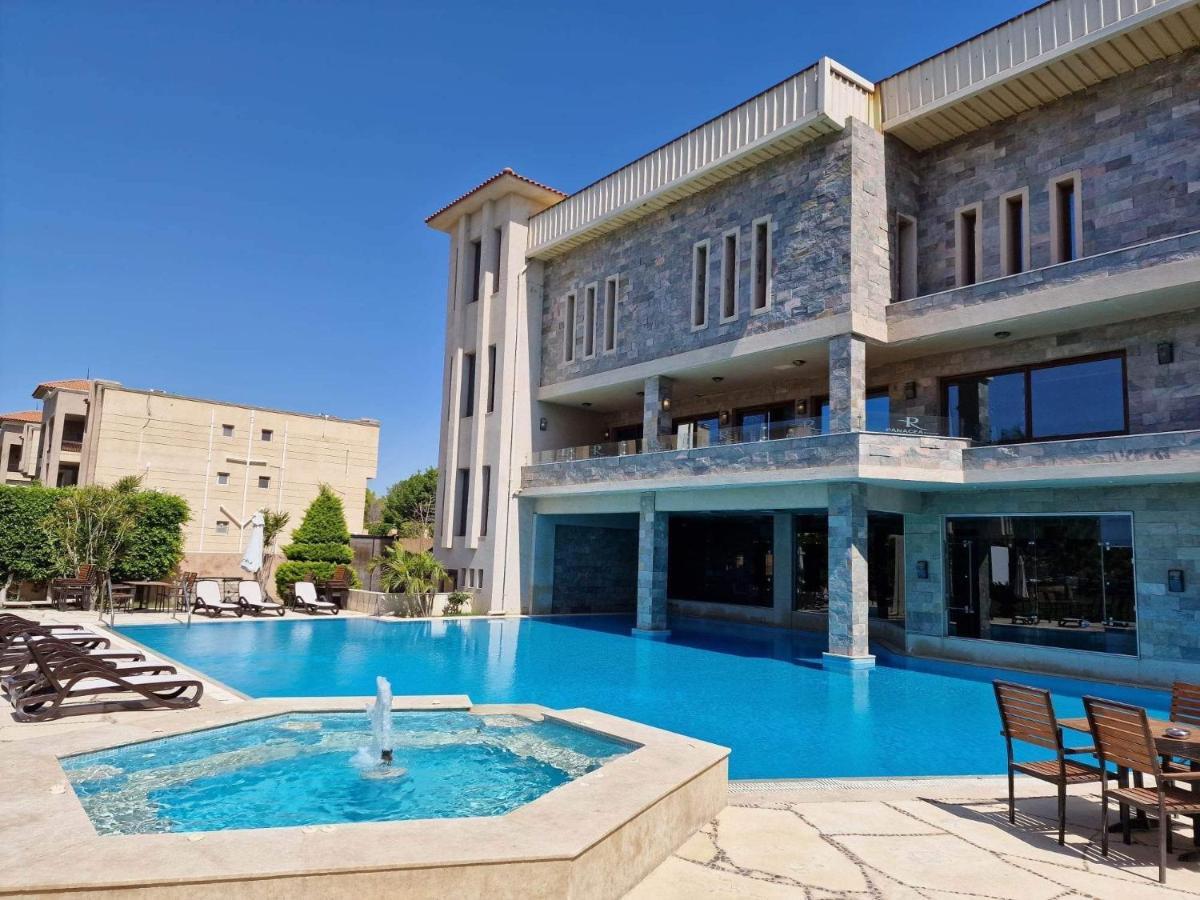 Panacea Suites Hotel Borg El Arab Exterior foto